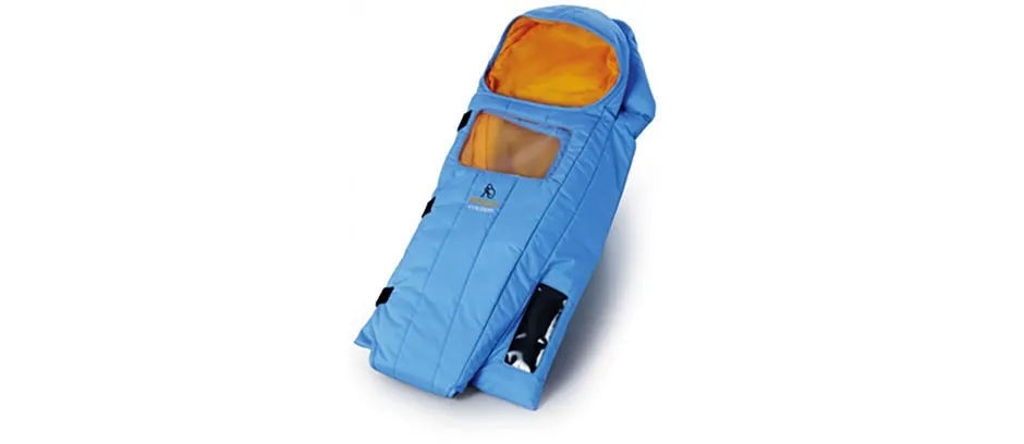 A sky blue and orange Embrace Warmer that looks like a small sleeping bag with a hood and plastic window on the front.